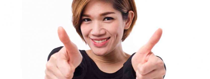 lady showing thumbs up to best home loan rates