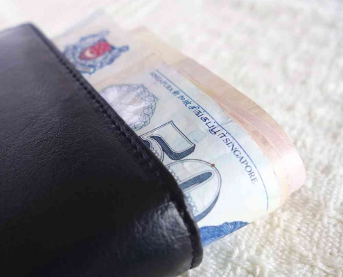 wallet with Singapore dollars