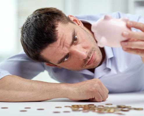 man looks at how much left for mortgage repayment