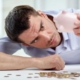 man looks at how much left for mortgage repayment